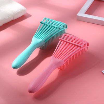 Hair detangling brush